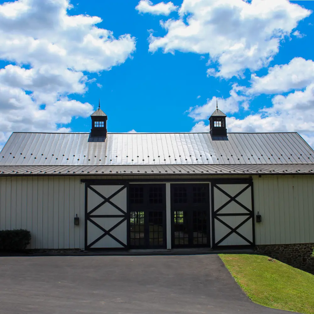 barn-edit sunny, blue sky and a barn with doors open